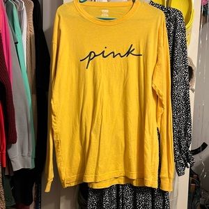 A pink yellow shirt, long sleeve